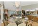 Open dining area adjacent to a living room and kitchen allowing seamless flow at 1137 Ponderosa Rd, Venice, FL 34293