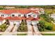 Exterior view of the charming multi-Gathering home with well-maintained landscaping at 1156 Jonah Dr, North Port, FL 34289