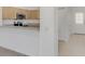Eat-in kitchen showing granite countertops and stainless steel appliances at 1156 Jonah Dr, North Port, FL 34289