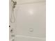 Clean shower with multiple shower heads and chrome fixtures, surrounded by white tile at 1156 Jonah Dr, North Port, FL 34289