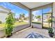 Screened-in patio with views of neighborhood at 1751 Nottingham Trl, Punta Gorda, FL 33980