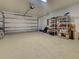 The attached garage has a durable floor and plenty of room for storage and parking at 18396 Laramie Ave, Port Charlotte, FL 33954