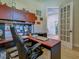 View of an office with a nice desk, office chair and other office accessories at 18396 Laramie Ave, Port Charlotte, FL 33954