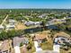 Aerial view of a waterfront property in a serene neighborhood setting at 18584 Alphonse Cir, Port Charlotte, FL 33948