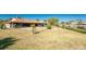 Wide angle showing large backyard that extends to a canal featuring a boat lift, perfect for waterfront enjoyment at 18584 Alphonse Cir, Port Charlotte, FL 33948