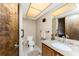 Neutral toned bathroom features a granite vanity top and tiled floors at 18584 Alphonse Cir, Port Charlotte, FL 33948