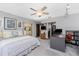 Spacious bedroom with office space and decorative pillows on the bed at 18584 Alphonse Cir, Port Charlotte, FL 33948