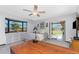 Bedroom with backyard access, a bay window, and lots of natural light at 18584 Alphonse Cir, Port Charlotte, FL 33948