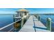 Picturesque dock with a charming gazebo overlooking calm waters, offering serene views and a peaceful retreat at 18584 Alphonse Cir, Port Charlotte, FL 33948