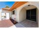 Inviting arched entryway with planters at the front door, adding curb appeal at 18584 Alphonse Cir, Port Charlotte, FL 33948