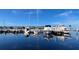 Picturesque marina featuring luxurious yachts and calm waters, offering a sophisticated waterfront lifestyle at 18584 Alphonse Cir, Port Charlotte, FL 33948