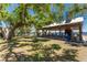 Picturesque park featuring a covered picnic area, playground, and lush greenery at 18584 Alphonse Cir, Port Charlotte, FL 33948
