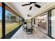 The large screened patio offers additional dining space and tranquil views at 18584 Alphonse Cir, Port Charlotte, FL 33948