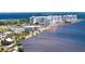 Luxury waterfront resort with modern architecture, pools, and beach access at 18584 Alphonse Cir, Port Charlotte, FL 33948