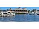 Elegant waterfront restaurant with picturesque views, offering a memorable dining experience and luxurious boating access at 18584 Alphonse Cir, Port Charlotte, FL 33948
