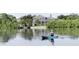 Enjoy the waterfront lifestyle with access to private dock, perfect for boating and enjoying the serene water views at 18584 Alphonse Cir, Port Charlotte, FL 33948