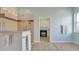 Bathroom featuring a walk-in shower, tile floor, and white cabinets at 19023 Midway Blvd, Port Charlotte, FL 33948