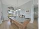 Game room featuring a pool table, stylish lighting, and beautiful tile flooring at 19023 Midway Blvd, Port Charlotte, FL 33948