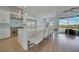 Modern kitchen with a large island, stainless steel appliances, and pendant lighting at 19023 Midway Blvd, Port Charlotte, FL 33948