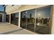 Modern home construction with large sliding glass doors overlooking the waterfront at 242 Bangsberg Se Rd, Port Charlotte, FL 33952