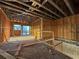 View of the interior framing showing the layout of the room with large windows at 242 Bangsberg Se Rd, Port Charlotte, FL 33952