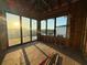Interior framing with bright windows showcasing a scenic waterfront view, awaits personalization to become a dream home at 242 Bangsberg Se Rd, Port Charlotte, FL 33952