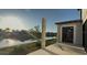 Waterfront patio featuring canal views and modern construction, offering an inviting outdoor space at 242 Bangsberg Se Rd, Port Charlotte, FL 33952