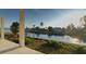 Scenic waterfront view showcasing lush landscaping and the picturesque canal and beautiful homes at 242 Bangsberg Se Rd, Port Charlotte, FL 33952