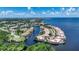 Stunning aerial view showcases waterfront homes, a bayou, and the beautiful coastal scenery at 25188 Marion Ave # 1033, Punta Gorda, FL 33950