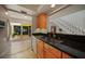 Well-lit kitchen showcasing granite countertops and seamless access to the living spaces at 25188 Marion Ave # 1033, Punta Gorda, FL 33950