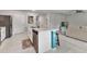 Bright kitchen featuring an island with seating and stainless steel appliances, perfect for entertaining at 25340 E Lenox Cir, Punta Gorda, FL 33950