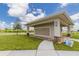 Community mail kiosk with multiple mailboxes, stone accents, and well-maintained landscaping at 25340 E Lenox Cir, Punta Gorda, FL 33950