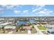 Scenic aerial view of a waterfront community with lush landscaping and beautiful waterways for boating and recreation at 2621 Via Veneto Dr, Punta Gorda, FL 33950