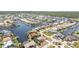 Beautiful waterfront community with canals and boats docked behind luxurious residences at 2621 Via Veneto Dr, Punta Gorda, FL 33950