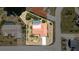 Aerial view of a single-Gathering home featuring a backyard pool, tile roof, and well-maintained landscaping at 2621 Via Veneto Dr, Punta Gorda, FL 33950