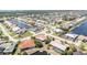 Picturesque aerial view of a waterfront neighborhood with canals and stunning residential properties at 2621 Via Veneto Dr, Punta Gorda, FL 33950