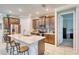 Well-appointed kitchen featuring stainless steel appliances, ample counter space, and a view to the adjacent room at 264 Soliera St, Nokomis, FL 34275