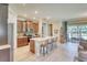 Bright and airy kitchen with a large island, modern appliances, and plenty of cabinet space for storage at 264 Soliera St, Nokomis, FL 34275