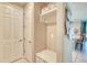 Convenient mud room with built-in bench seating, coat hooks, and storage cubbies to keep your entryway organized at 264 Soliera St, Nokomis, FL 34275