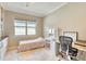 Inviting office space featuring a small bed, vanity, and natural light creating a cozy and productive work environment at 264 Soliera St, Nokomis, FL 34275