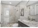 Modern bathroom featuring glass shower with bench, granite counters, and vessel sink at 310 Severin Se Rd, Port Charlotte, FL 33952