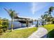 Scenic waterfront view featuring a private boat dock, perfect for boating enthusiasts and enjoying waterfront living at 310 Severin Se Rd, Port Charlotte, FL 33952