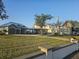 Stunning home with lush lawn, detached garage, and ample parking at 310 Severin Se Rd, Port Charlotte, FL 33952