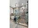 Stylish bathroom featuring tub, glass shower, and contemporary fixtures at 310 Severin Se Rd, Port Charlotte, FL 33952