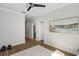 Well-lit office with hardwood floors and ample storage with bath access at 310 Severin Se Rd, Port Charlotte, FL 33952