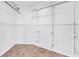 Organized closet featuring wire shelving and tiled flooring, maximizing storage space at 312 Darst Ave, Punta Gorda, FL 33950