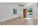 Bright dining area with tiled floors and sliding glass doors leading to the pool at 312 Darst Ave, Punta Gorda, FL 33950