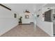 Living room featuring tile floors, a ceiling fan and an open concept design at 312 Darst Ave, Punta Gorda, FL 33950