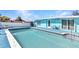 A beautiful pool area with patio area, perfect for relaxing and entertaining outdoors at 312 Darst Ave, Punta Gorda, FL 33950