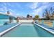 Outdoor pool surrounded by a patio, ideal for relaxation and outdoor enjoyment at 312 Darst Ave, Punta Gorda, FL 33950